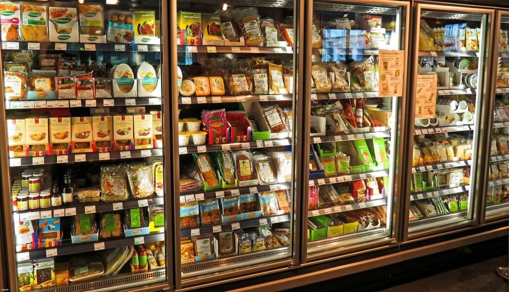 refrigerator interior with various foods and bad odor concept