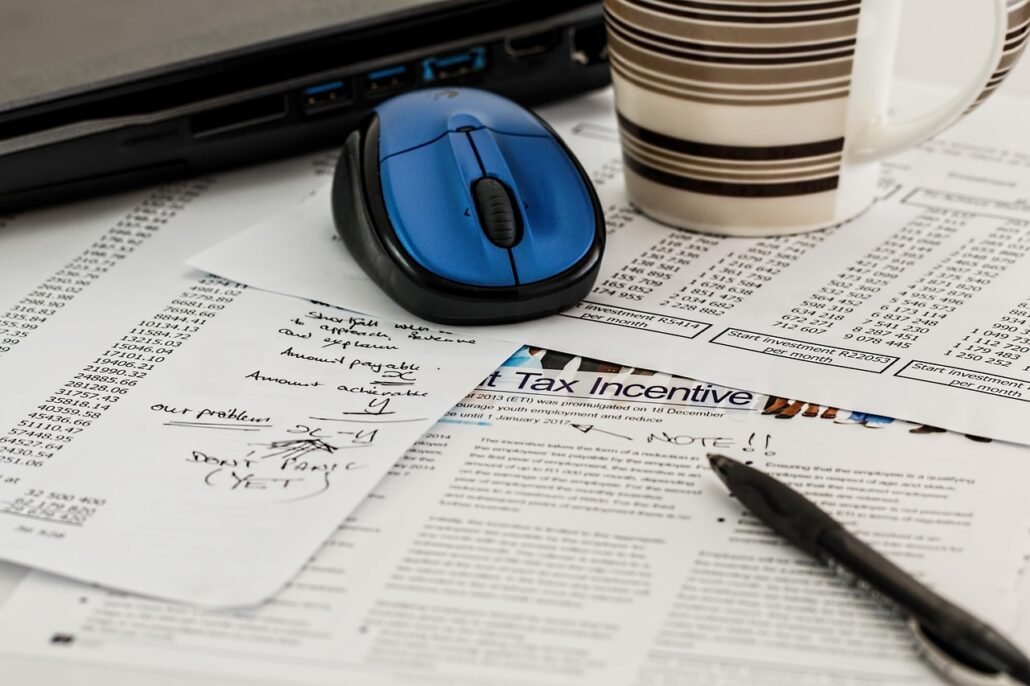 Korean woman reviewing tax refund documents at home desk