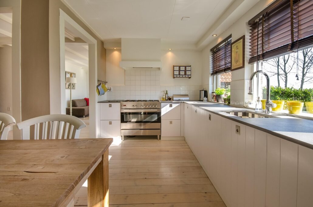 clean organized kitchen sink with natural morning light