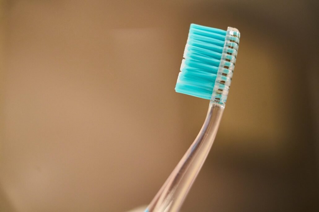 old toothbrush cleaning window groove