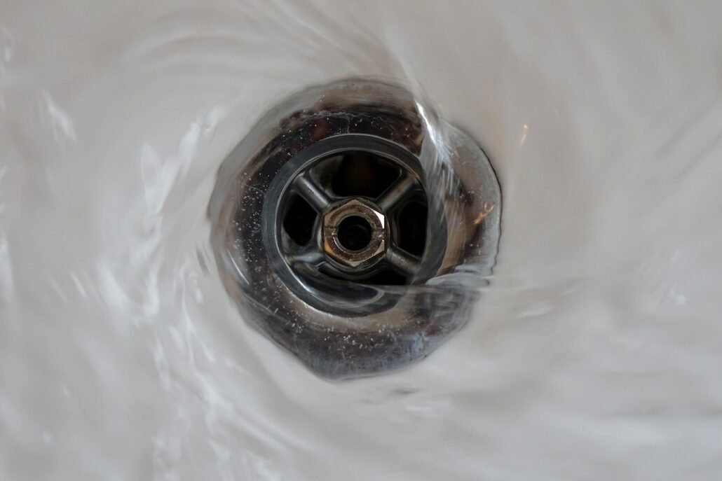 bathroom drain smell prevention water pouring