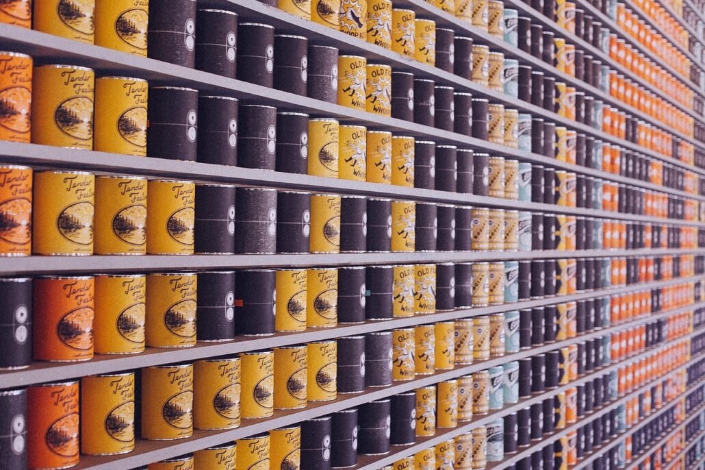 organized freezer with small food waste container on the door shelf